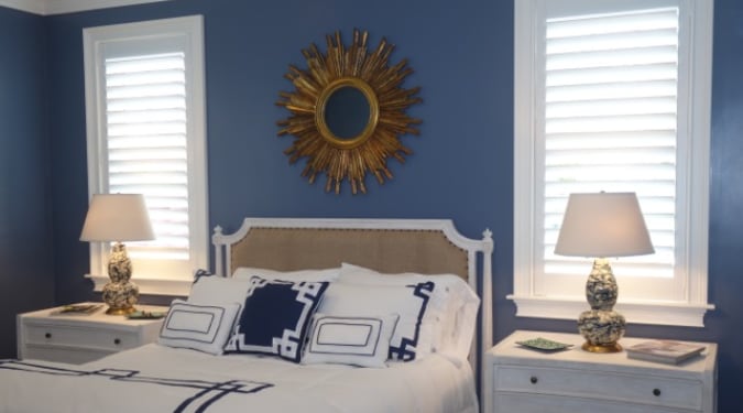 Plantation shutter in a bedroom